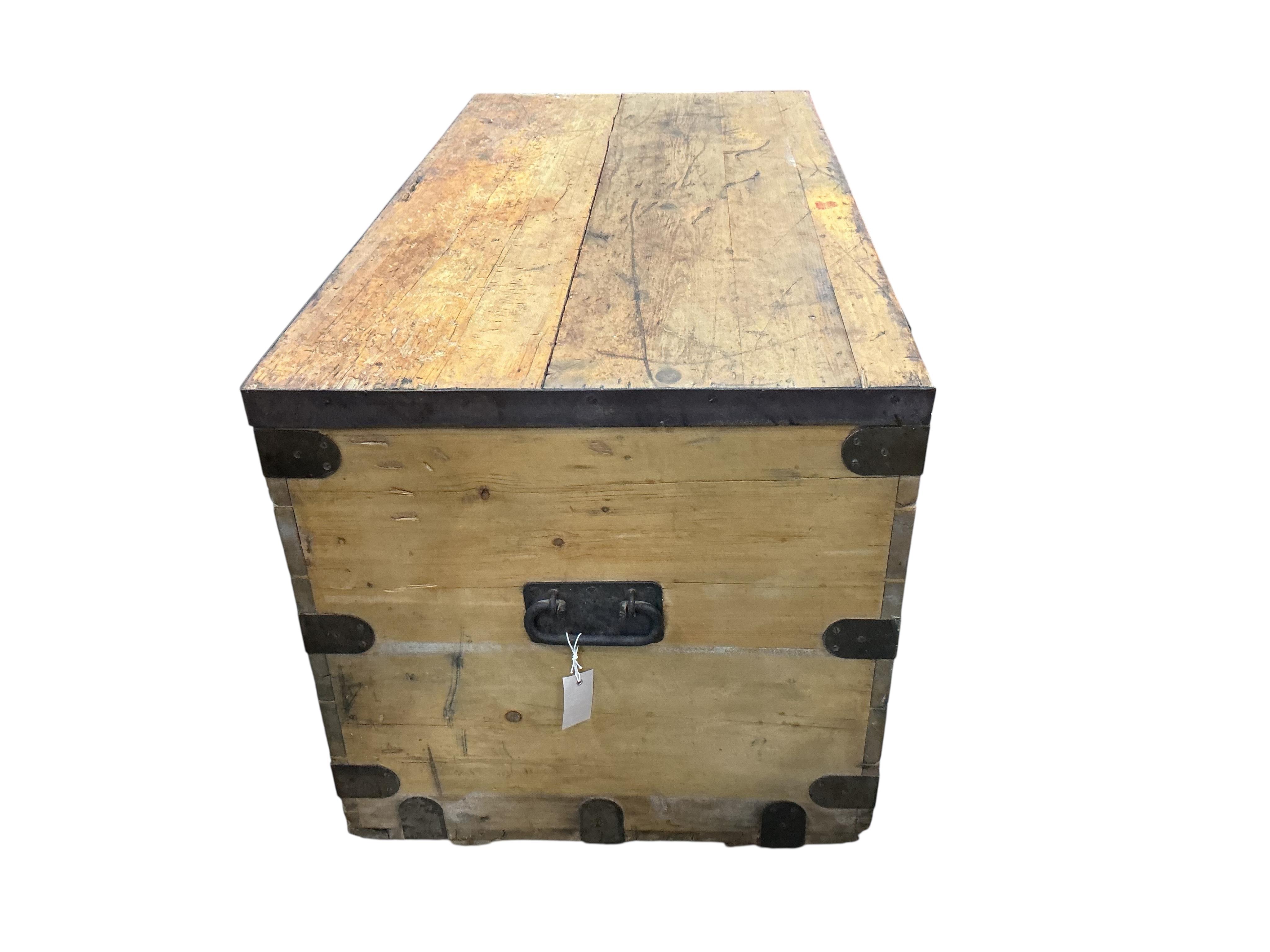 A large iron bound pine trunk, width 120cn, depth 61cm, height 61cm